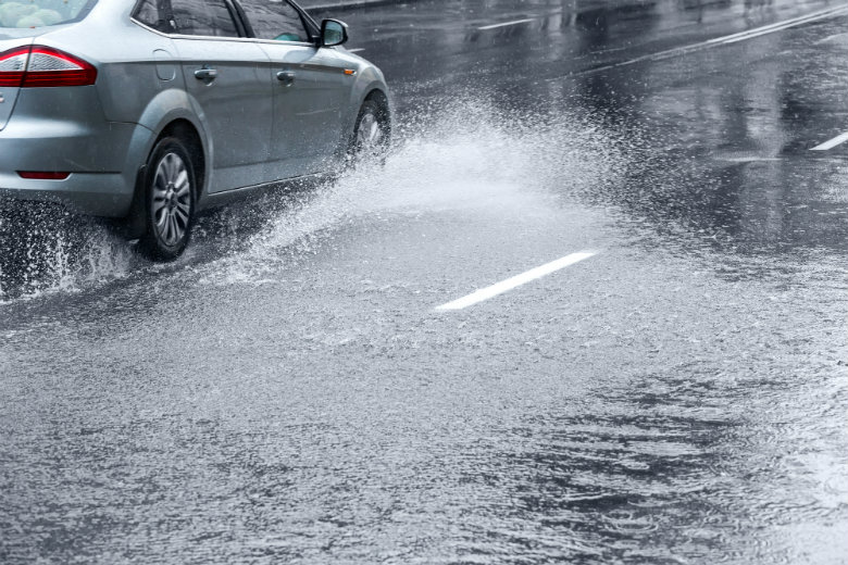 Car Driving In Rain