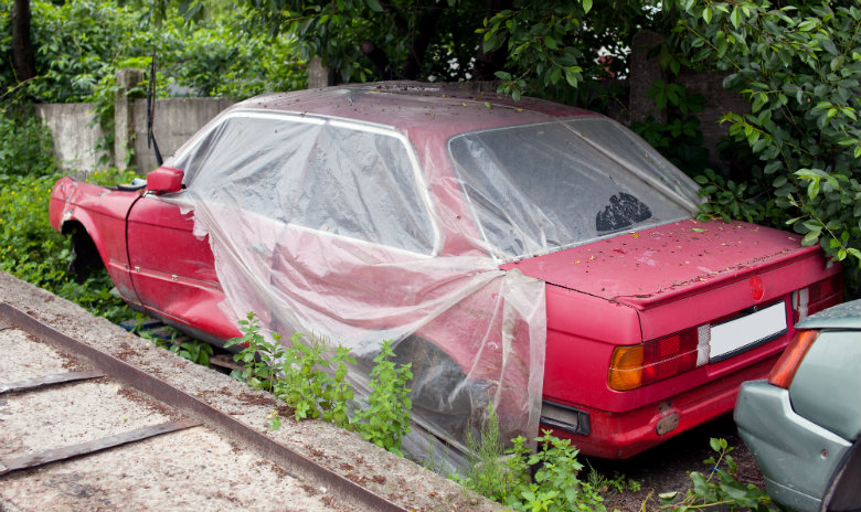 Damaged red car