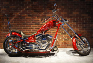 Red Chopper on brick wall