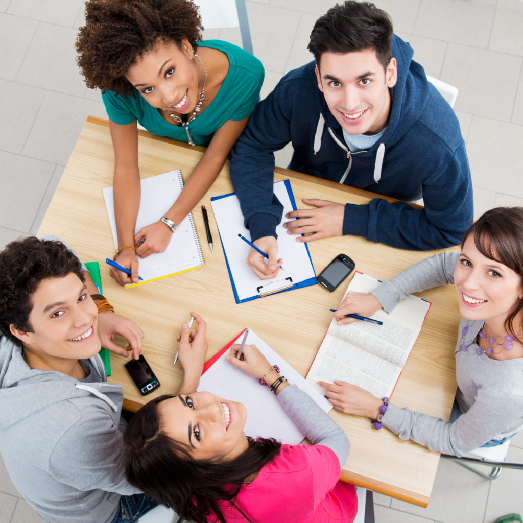 Group of Young Students Studying 